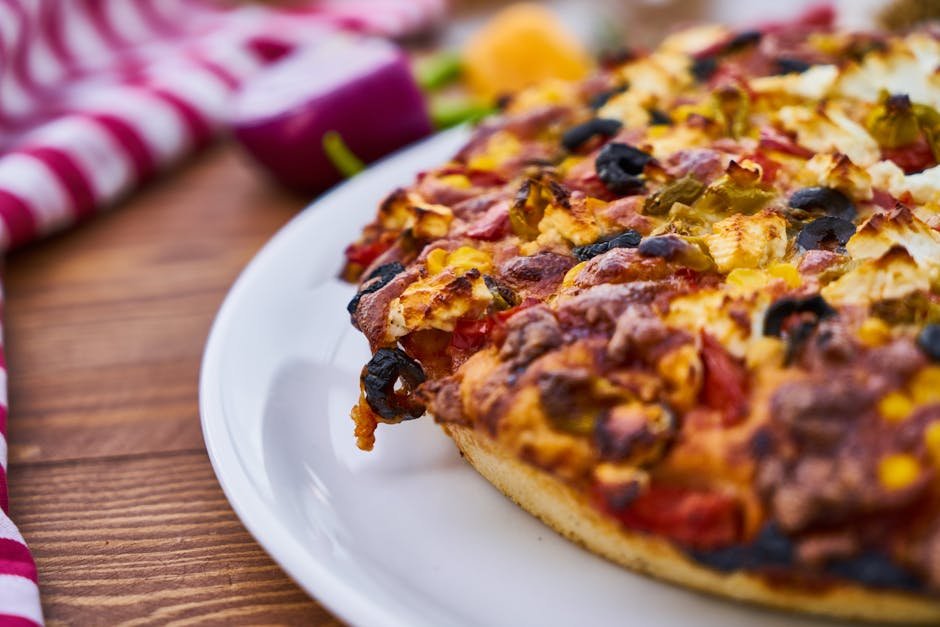 Mouth-watering homemade pizza topped with fresh ingredients, ready to serve.